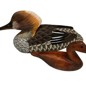 Wooden hand carved duck decoy set. Beautiful design and hand painted.